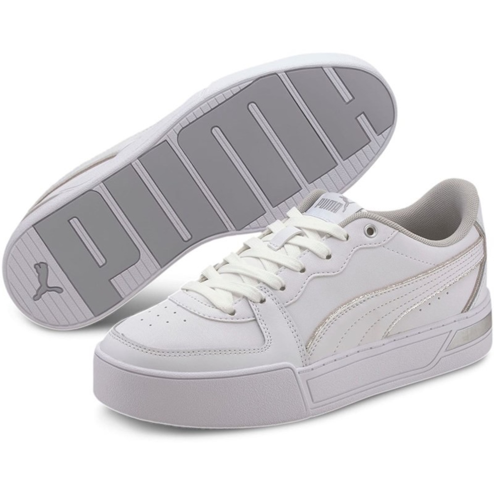 In new condition Puma sneakers with silver detail